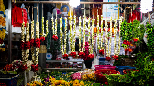 Rose Necklaces Hanging in a Shop